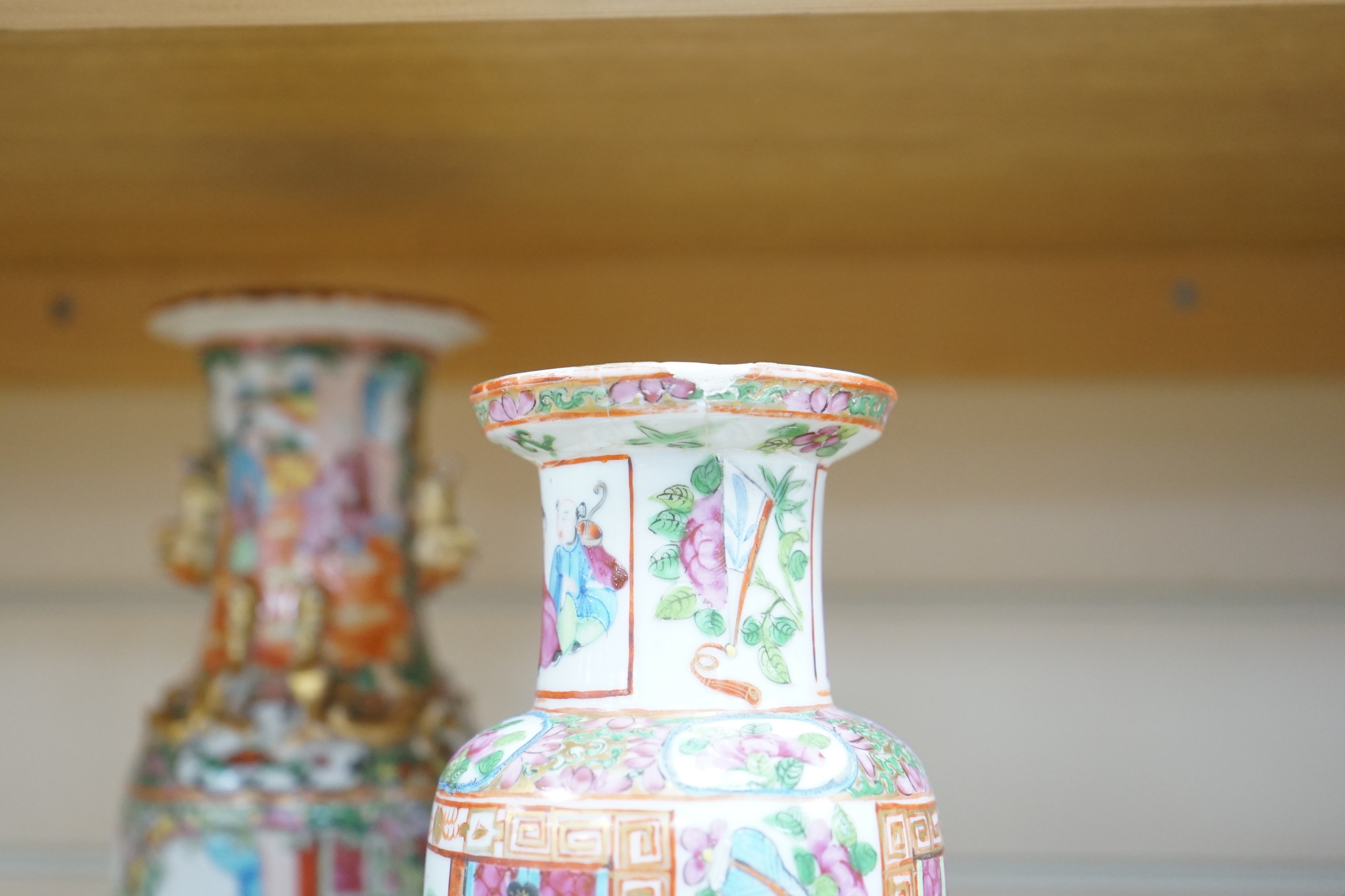 Three Chinese famille rose vases and a teapot, late 19th/early 20th century, tallest vase 29.5 cms high